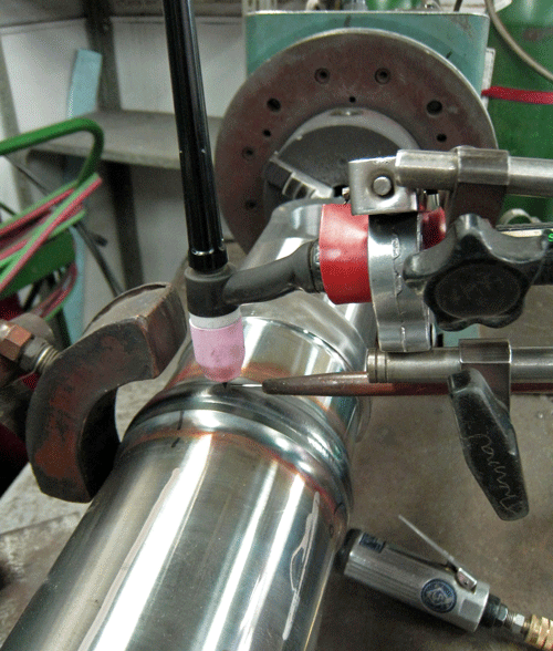 Semi-automatic TIG welding station.