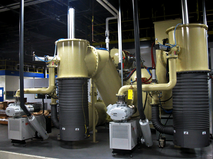 Figure 1 [1] High Vacuum Furnace with Dual Diffusion Pumps To Achieve Operating Pressures in the Range of 1.33 x 10-3 Pa (10-5 torr) to 1.33 x 10-4 Pa (10-6 torr) (Photograph Courtesy of Vac Aero International)