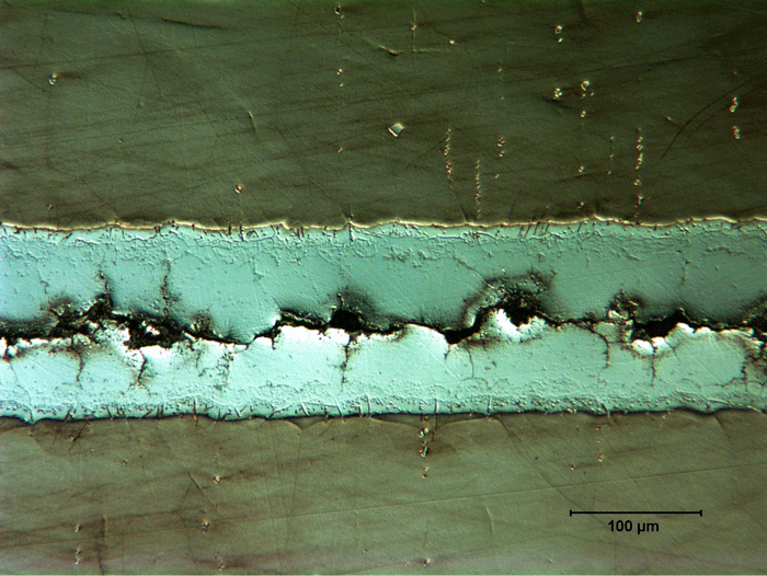 Fig. 4 - Continuous centerline eutectic in nickel-brazed joint, with resultant crack down center of eutectic phases
