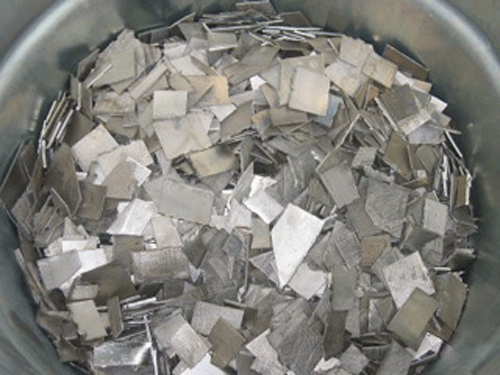 Fig. 4 --  Titanium sheet cut up into small pieces for scrap.