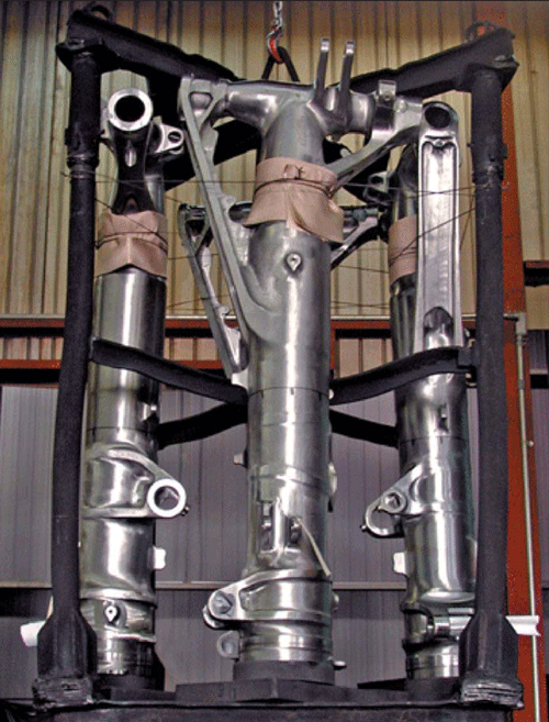 Figure 2 – Typical heat treated load of landing gear racked for vacuum oil quenching.