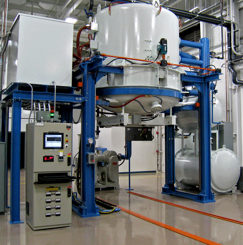 Fig. 2 - Typical Vacuum Furnace Shop - (a) Vertical Style Vacuum Furnace