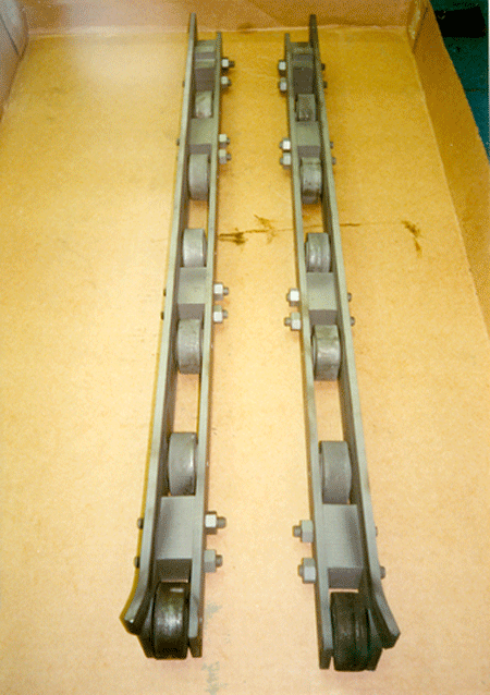 Figure 2 – Combination Molybdenum/Graphite/Tungsten Hearth Rail Assembly in a Continuous Vacuum Furnace (Photograph Courtesy of C. I. Hayes, a Gasbarre Furnace Group Company)