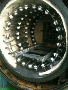 Figure 1 - Oil soaked insulation in a vacuum tempering furnace (oil introduced with product).