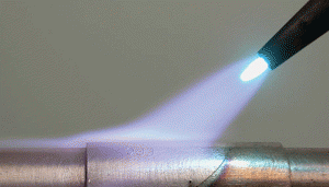 Fig. 1 -- Brazing torch being used to heat metal locally for application of brazing filler metal to one specific area of the total component assembly.