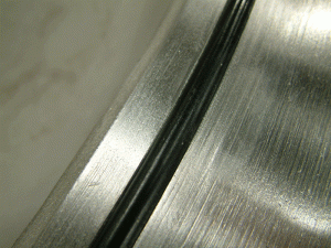 Figure 2 - Typical Dished Head “O” Ring Seal (Photograph Courtesy of VAC AERO International Inc.)