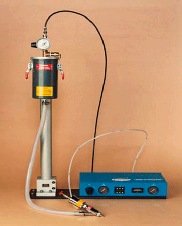 Figure 11. Note that the brazing paste is contained in a solid container at the top left of this photo, and could be looked at as being a large, metal-walled, cartridge, so to speak. Likewise, the dispensing head is also made of metal, and is known as a Positive-Displacement Dispensing head.