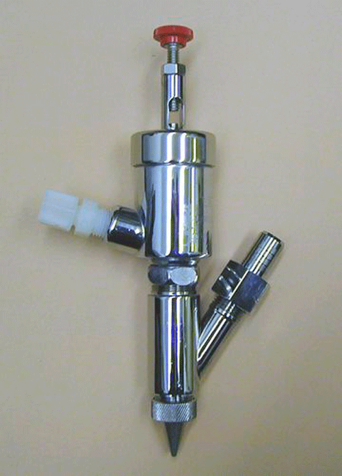 Figure 7. Typical positive-displacement dispensing (PDD) head for BFM paste application.