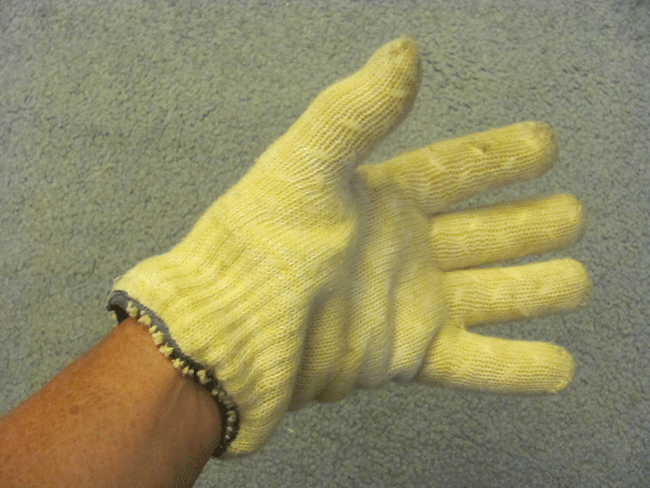 Fig. 4 A heavy-duty cotton glove with silicon beads on the surface to protect hands from heat. Bulkier than the gloves shown in Fig. 3, but much safer for handling hot metal.