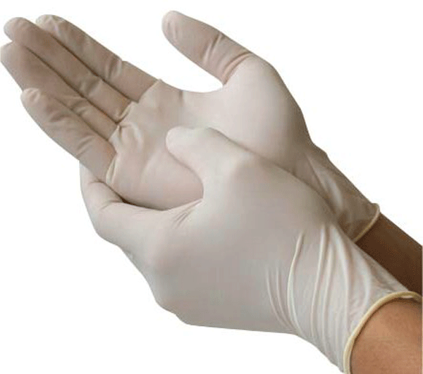Fig. 2 -- Gloves can be made from vinyl, latex, or nitrile rubber, and must not have powder on the inside, since that powder will contaminate the work area.