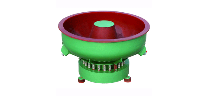 Fig. 3 Photo of a typical vibratory tumble-deburring machine, showing the springs to cushion the movement of the container, and the rubberized vibration-isolation feet below the machine. (Photo courtesy of ShinySmooth)