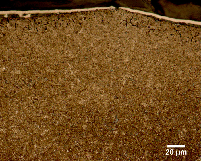 Fig. 2. Carburized Component Exhibiting IGO to a Depth of Approximately 0.020 mm (0.007”) (Photograph Courtesy of George Vander Voort Consulting)