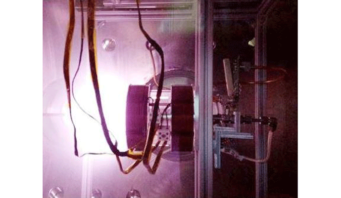 Figure 1 | Helicon double layer plasma thruster under test in a space chamber 2