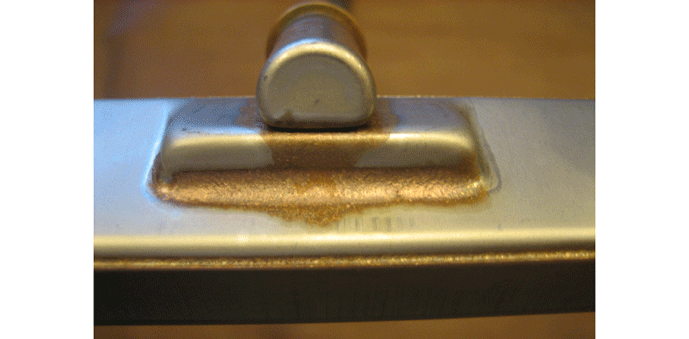 Fig. 8 In this situation, too much BFM was applied to the top fitting, which then ran down onto the next surface, combining with the extra BFM that was also applied on that layer, the resulting excess BFM then flowed down onto the lower ledge, causing fit-up issues.