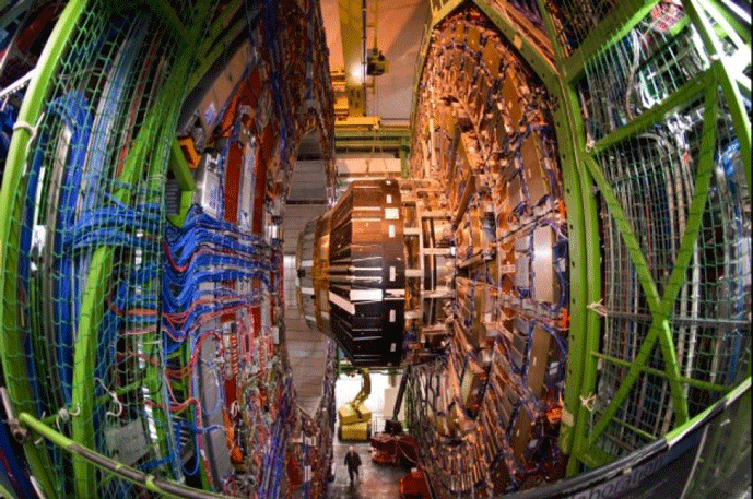 Figure 4 | The CMS is a general-purpose detector at the LHC. The person walking beneath it provides a sense of scale.4