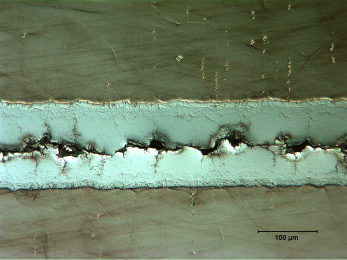 Fig. 2 Crack propagated through center of thick nickel-brazed joint.
