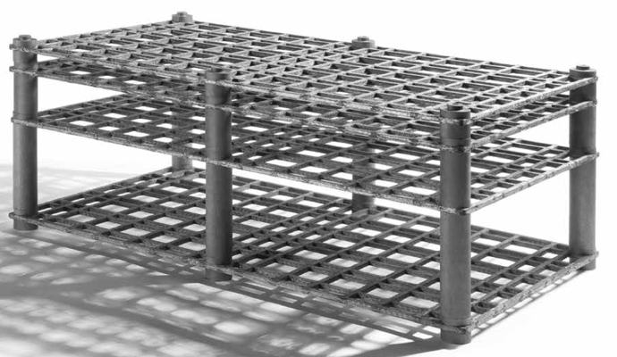 Fig. 3 - A stacked assembly of C/C grates to form a multi-level fixture for brazing or heat-treating many components in the same furnace run. Photo courtesy of Schunk Graphite.