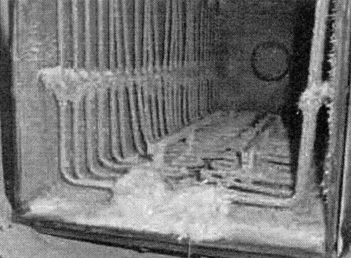 Fig. 2 -- Photo of hot-zone in a vacuum-furnace chamber that has been badly corroded by flux gases in a furnace.