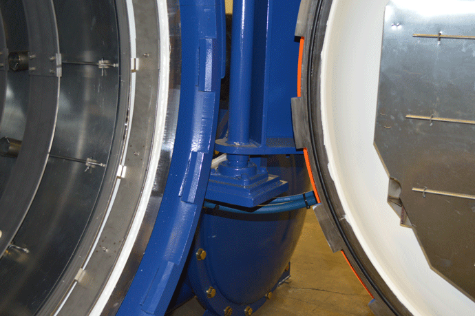 Fig. 3b   Note the strong self-locking mechanism of the vacuum furnace door, so that it will keep the door tightly in place even when the atmospheric pressure inside the furnace reaches as high as twenty (20) times atmospheric pressure