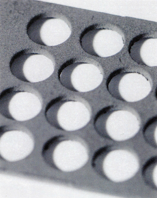 Fig. 8 Header-plate coated with BFM powder from a spray-gun. (Photo courtesy of Hoganas AB, Sweden)