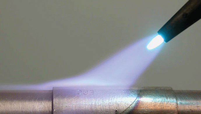 Fig. 6 For correct torch brazing, the torch-flame is directed down on the fitting, NOT on the top of the joint (Photo courtesy of JWHarris)